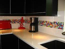 Glass tiles tend to be conversation starters, thanks to this iridescent, metallic quality. Susan Jablon Mosaics Kitchen Backsplash Kitchen Design Decor Kitchen