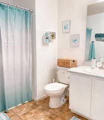This space shows that using only a few colors can make for an exciting and unique space. Nautical Bathroom Designs With Unique Nautical Decor Ideas