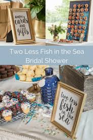 See more ideas about bridal shower, beach theme wedding, beach bridal showers. Two Less Fish In The Sea Bridal Shower Bridal Shower Theme Diy Wedding Theme Wedding Decorations On A Budget