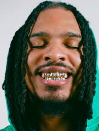 Let me see your grill!' in my Paul Wall voice 😆Looks like  boxer-turned-food influencer Keith Lee is out here showing off his fresh  gold grill! What y'all think of the look? #KeithLee #