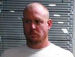 Former football player arrested