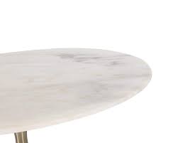 A geometric base is constructed of beautiful brushed metal. Telma Dining Table Brushed Brass Tbilisi Interiors