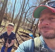 Black lab walking down pleasant valley
