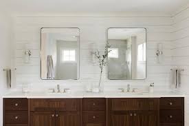 Illuminated By White Glass Tube Sconces Restoration Hardware Bristol Flat Mirrors Are Hung From A White Shipl Double Vanity Bath Vanities Bathroom Tub Remodel