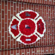 It is a cross with v shapes on the ends. Fire Department Maltese Cross Only Owings Maryland Florist Floral Expressions