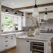 3 sconces over kitchen sink design ideas