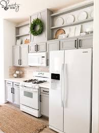 How To Make Cabinets Taller Diy Kitchen Renovation Painting Kitchen Cabinets New Kitchen Cabinets