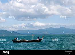 fishing boat in andaman sea, ranong, southern thailand Stock Photo - Alamy