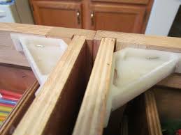 My question is, should i take the time to install a horizontal brace between the wall studs to make mounting the upper cabinets easier? 35 Need Corner Braces In Each Corner Of The Cabinets To Attach The Counter Top Drill Hole Then Attach With Appro Diy Kitchen Island Diy Kitchen Countertops