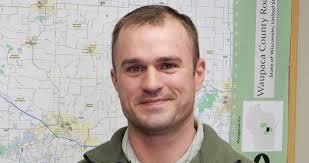 County names highway commissioner