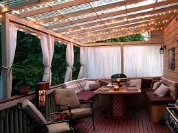 Exteriors Outdoor Wooden Deck With Pergola Porch Awning Ideas And White Sheer Curtains Cover Also Amazing Bulb Ce Relaxing Outdoor Spaces Outdoor Rooms Patio