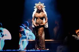 The superstar posted an image of herself kneeling in front of a floral archway. Beyonce Jennifer Lopez And More Stars Who Ve Performed Pregnant Vanity Fair