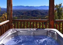 This 10 bedroom cabin offers a spacious deck with lots of rocking chairs, so you can take in the incredible mountain vistas. Pigeon Forge Cabin Rentals Summit View Lodge