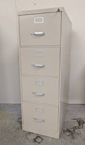 Cabinet 17 3/4x29 1/2 $ 60. Tan 4 Drawer Vertical Legal File Cabinet