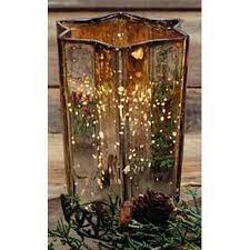 Select from our large selection of mercury glass candle holders and mercury glass vases. Large Silver Mercury Glass Star Candle Holder Walmart Com Walmart Com