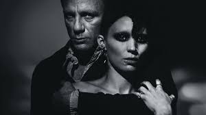 The Girl with the Dragon Tattoo (2011) Directed by David Fincher  Investigative journalist Michael Blomkvist (Daniel Craig) is hired by an  elderly industrial tycoon to investigate the 20-year-old unsolved murder of  his