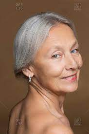 Hairy boys nude and beachboy gay mr. Portrait Of Naked Senior Woman With Grey Hair In Front Of Brown Background Stock Photo Offset