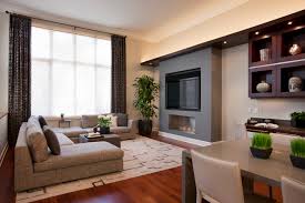 Everything placed in the room, should be balanced off of the window, for instance, to balance the weight of the window, place a larger pieces of furniture, like a bookcase unit, on the opposite end of the room. 13 Ways To Dress Wide Windows