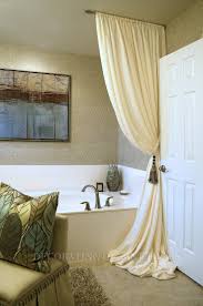 Like This Half Curtain Rod Mounted On The Ceiling And The Beautiful Puddled Drape A Very Chi Luxury Shower Curtain Bathroom Window Treatments Elegant Bathroom