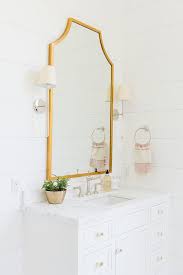 Combining white and gold speaks on a bathroom owner who wishes to create a clean and premium one. White And Gold Bathroom Design Ideas