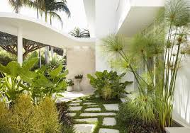 With a slim, tall frame, this bookcase is perfect for placing against the wall of a small home office or tucked into the corner of the family room. A Modern Mid Century Modern Garden