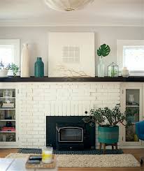 Removing paint from a brick fireplace is an involved process and will take sanding, scraping, and stripping. My Husband Loves Our Ugly Brick Fireplace Laurel Home