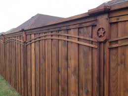 The spaces alternate on both sides of the fence, leaving no visible gap between the pickets. 8 Ft Board On Board Cedar Fence Lifetime Fence Wood Privacy Fences