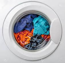 Some washing machines also give you a temperature range for each setting. Washing Machine With Color Clothes Inside Stock Photo Picture And Royalty Free Image Image 63465457