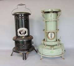 This convection heater runs quiet, no batteries. Lot Art Aladdin Blue Flame Heater 53cm High Together With A Further Valor Junior Heater 2