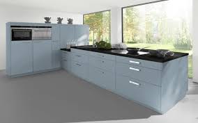 Featuring glazed wall units, curve base units with granite worktops and complimenting up stands. Sorrento Kitchen Doors