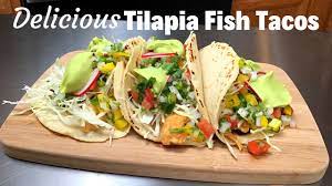 Arrange the fish in the prepared dish. Tilapia Fish Tacos With Cabbage Slaw Creamy Avocado Sauce Tempura Batter For Tilapia Youtube