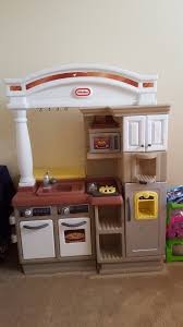 Play Kitchen Baby Kids For Sale On Hinesville Bookoo Kids Play Kitchen Play Kitchen Wall Decor Game Room