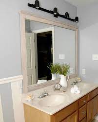 There are a wide variety of mirrors to choose from. 10 Stunning Ways To Transform Your Bathroom Mirror Without Removing It Bathroom Mirror Driftwood Mirror Mirror Frames