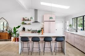 Natural Elements And A Pale Pink Kitchen Make This Austin Pad So Enviable Hunker Pink Kitchen Ranch Style Home Kitchen Design