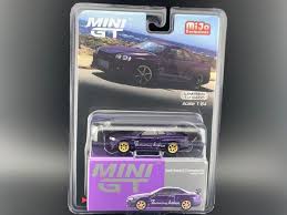 Mini GT Nissan GT-R R34 Tommykaira RZ Midnight Purple MGT00616 164 | eBay