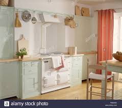 white aga in shaker style kitchen with