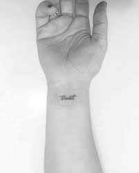 40 Minimalist One Word Tattoo Ideas That Are Beautiful On Every Woman Word Tattoos Self Love Tattoos Enough Tattoos For Women