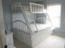 Buy top selling products like alaterre rustic panel twin bed in grey and powell youth bedroom gabby twin bed in a box furniture. Custom Queen And Xl Twin Bunk Bed With Full Trundle By Weber Wood Designs Custommade Com