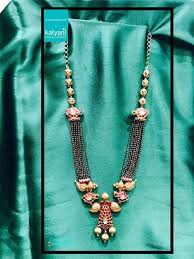 Browse through the collections of beautifully designed pearl nepal necklace on alibaba.com. Temple Work Np Chain Temple Work Chain With Black Beads Code 18675 For More Det Black Beaded Jewelry Gold Jewellery Design Necklaces Jewelry Design Necklace