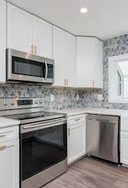 White Cabinets With Colorful Backsplash Online Kitchen Cabinets Wholesale Kitchen Cabinets Cabinet