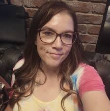 What are recommendations for a bee keeper to remove a hive from a local  business?