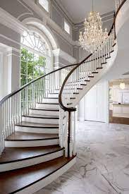These Foyers With High Ceilings Are Full Of Drama Staircase Design Traditional Staircase House Design