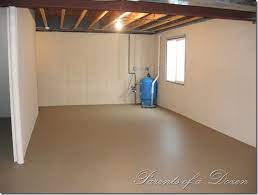 After patching the holes and bumps in our walls, i was ready to give everything a nice coat of paint! Parents Of A Dozen Painting An Unfinished Basement Basement Makeover Diy Basement Unfinished Basement