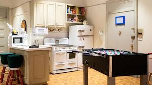 She divides the space visually by switching from walls in 'nabis' by adam bray for papers and paints in the living area to a custom apricot shade in the kitchen. Spend A Night At The Friends Apartment For Just 20 Nerdist