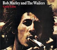 Who does the artwork for his album covers?