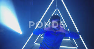Break Dancer Dancing Against Blue Background With Triangle Shape Of Led Lights Stock Footage Ad Blue Background D In 2020 Blue Backgrounds Triangle Shape Led Lights