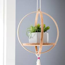 How To Make A Hanging Shelf Out Of Embroidery Hoops Embroidery Hoop Crafts Diy Hanging Diy Hanging Planter