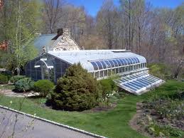Typical features include a pyramidal roof, a projecting porch and broad eaves which kept out the rain. Estate Orchid Greenhouse Glass House Llc