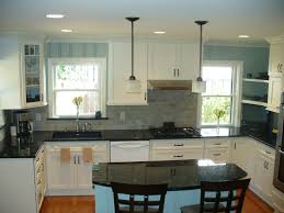 Check out our countertop cupboard selection for the very best in unique or custom, handmade pieces from our kitchen décor shops. Dark Counters With White Cabinets Are Growing On Me Custom Kitchen Cabinets Kitchen Black Counter Wood Floor Kitchen