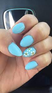 But almond nails are one of the most classic looks around. Short Light Blue Matte Almond Nails With White Flowers Blue Nails Acrylic Nails Almond Matte Matte Almond Nails